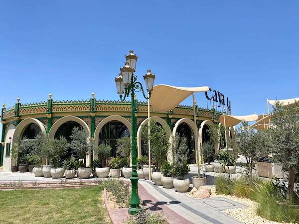 caya cafe sharjah islamic world garden