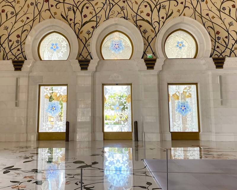 floral designs on walls, floor and windows at sheikh zayed grand mosque abu dhabi