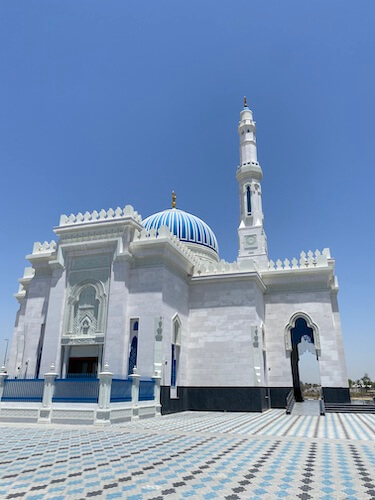 blue and white mosque kalba