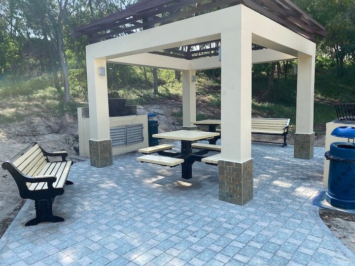 Al Mirfa walkway barbecue area - concrete grill, table and chairs