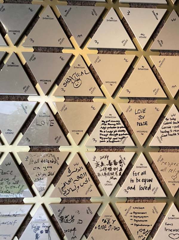 Messages from visitors on the Intentions Board at The Forum Abrahamic Family House
