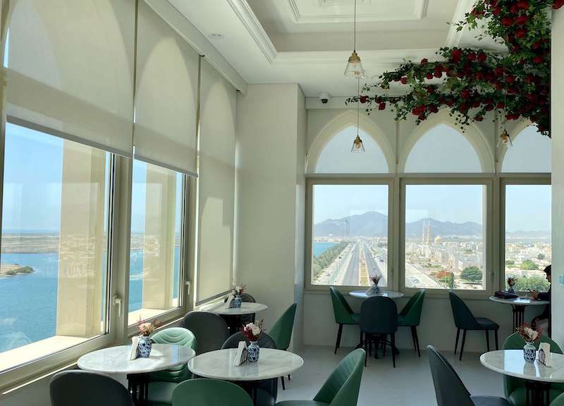 gardenia cafe in kalba clock tower and view over lake, gardens and town