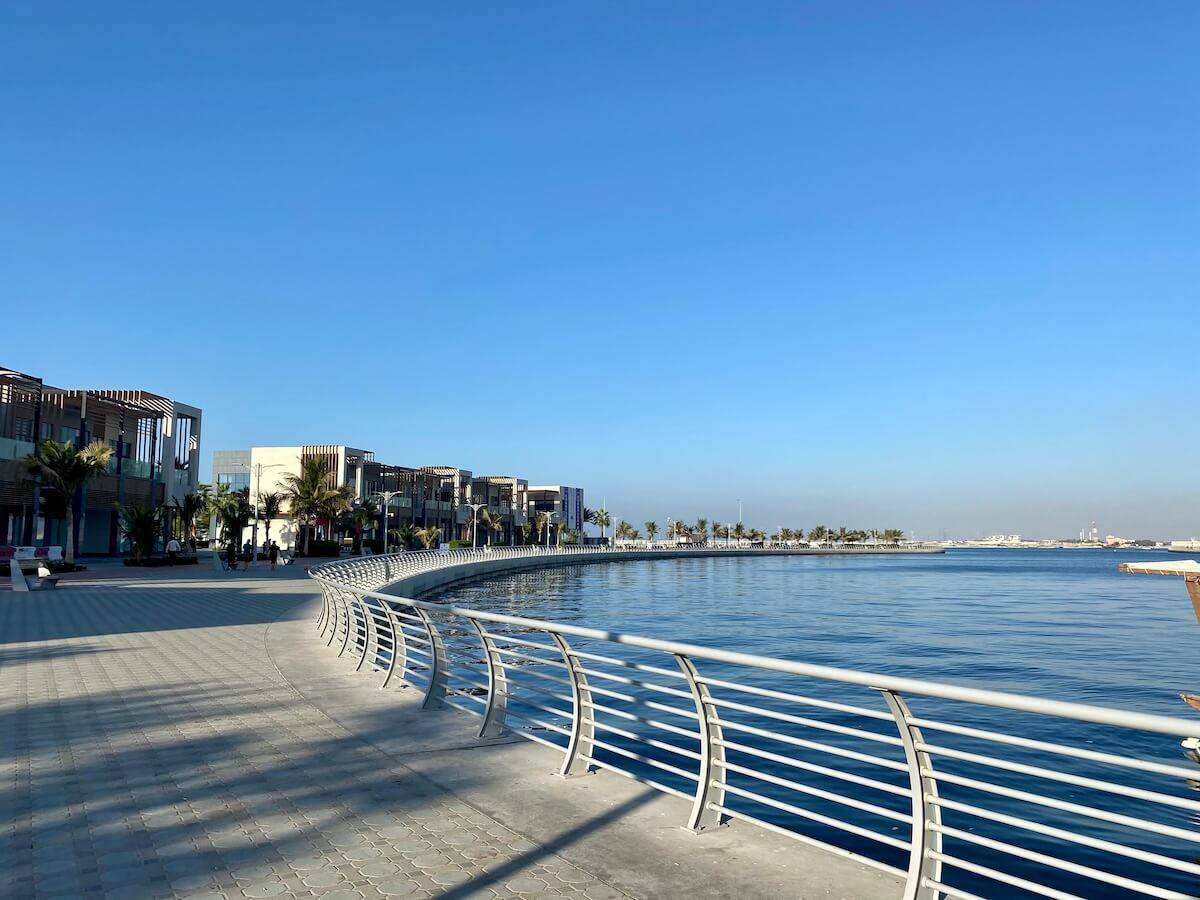 Waterfront with promenade lined with cafes and restaurants
