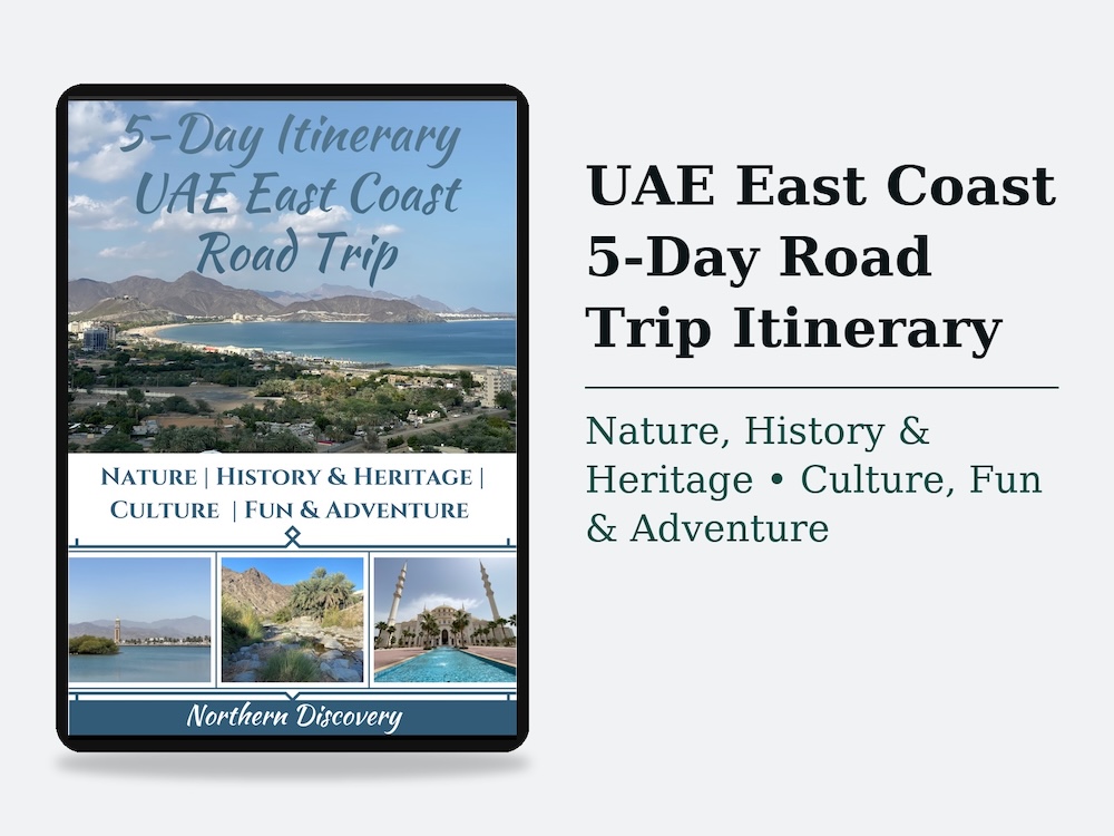 Cover page of a digital guide titled “5-Day Itinerary UAE East Coast Road Trip.” The design shows a coastal landscape with mountains and sea, plus smaller photos of landmarks and nature. Subheading reads “Nature, History & Heritage | Culture | Fun & Adventure.” The guide is branded as “Northern Discovery.”